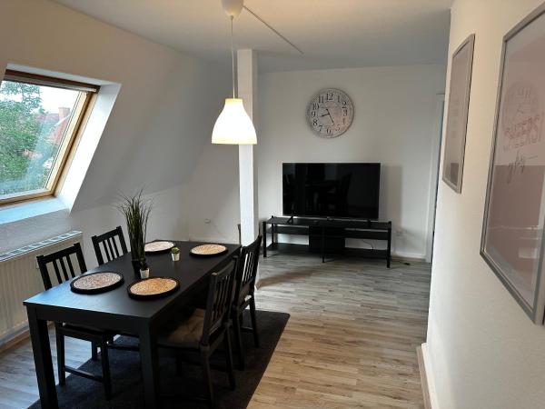 На фото показан объект A&V Apartments Schöne Dachgeschoss Wohnung Apt Sterne, расположенный в городе Beckhausen.