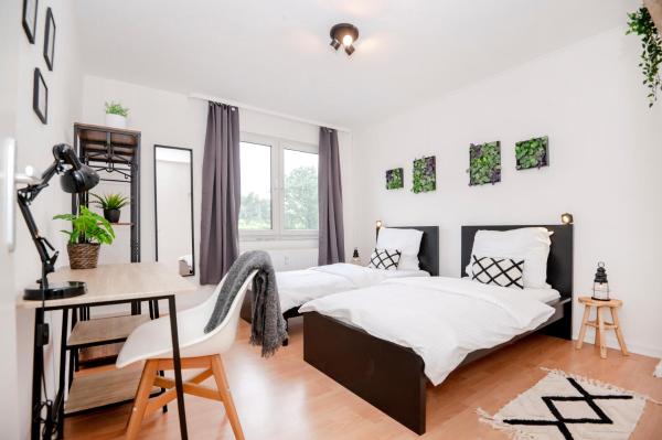 A la foto es mostra l'objecte Green Apartment for 4 - Essen, Kitchen, WIFI, Netflix situat a la ciutat de Essen.