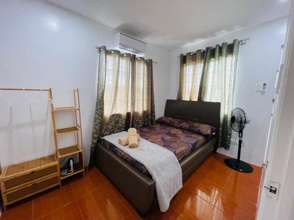 A la foto es mostra l'objecte Modern Cozy 3BR Near Air-conditioned & Free Parking situat a la ciutat de Silang.