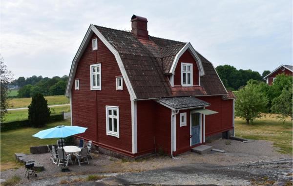 A la foto es mostra l'objecte Three-Bedroom Holiday Home Bräkne-Hoby With A Fireplace 05 situat a la ciutat de Bräkne-Hoby.