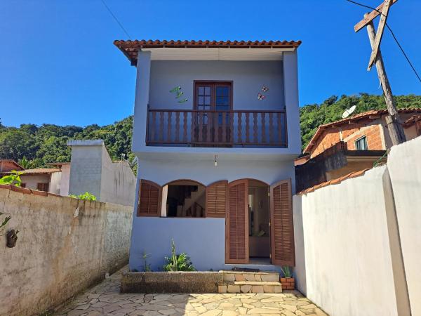 A la foto es mostra l'objecte Casa Aconchegante situat a la ciutat de Parati.
