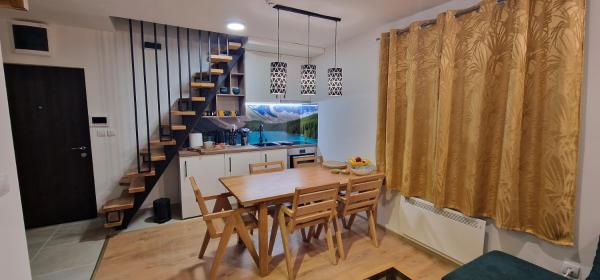 Na zdjęciu widoczny jest obiekt Vila Jahor Apartman 18 Jahorina położony w mieście Jahorina.