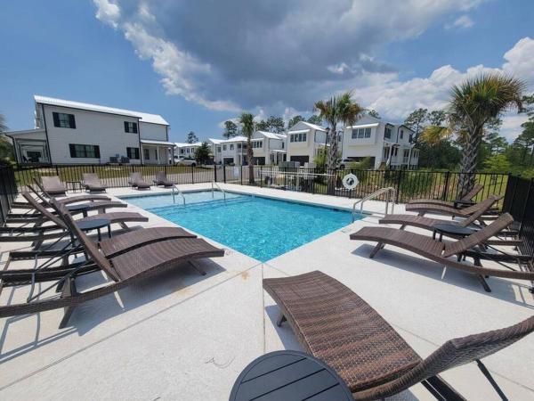 Na fotografii je vidět objekt 5 Star 4/3 sleeps 16 with Arcade GAME ROOM & POOL! nacházející se ve městě Orange Beach.