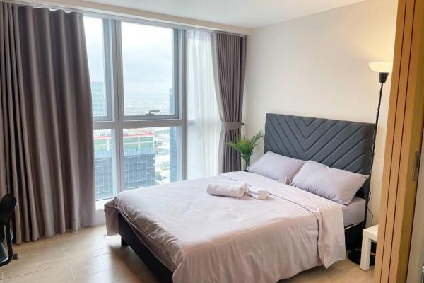 A la foto es mostra l'objecte Modern & Sleek 1 BR Uptown Parksuites situat a la ciutat de Manila.