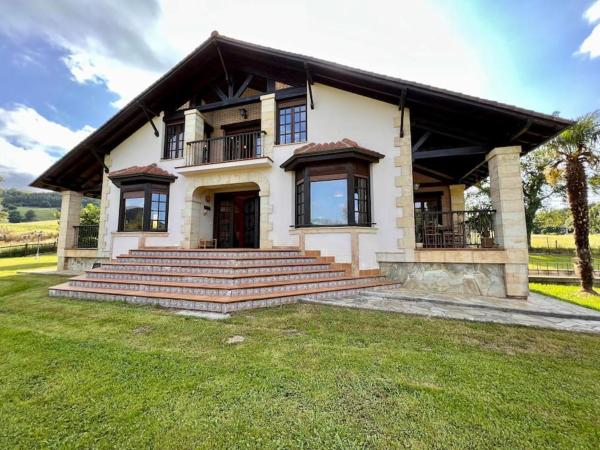A la foto es mostra l'objecte Acogedora casa en Solórzano situat a la ciutat de La Collada.