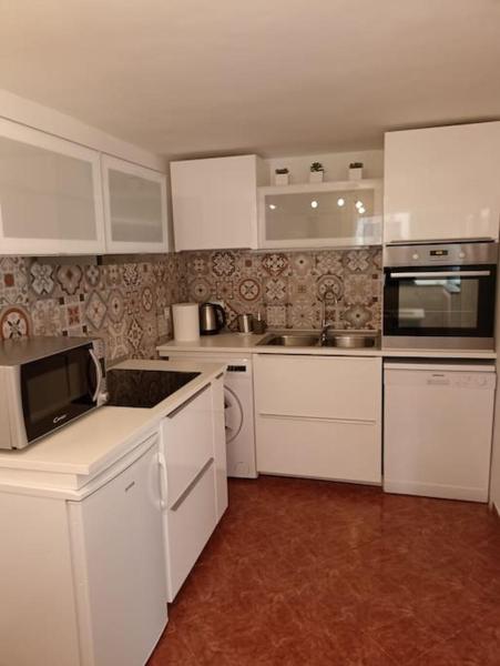 A la foto es mostra l'objecte Apartment with a garden view situat a la ciutat de Rijeka.