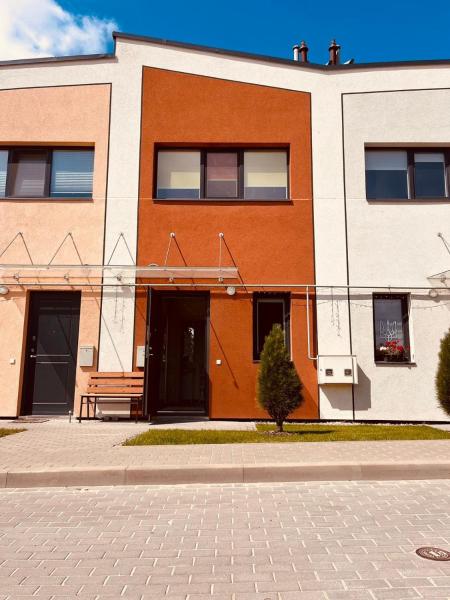 A la foto es mostra l'objecte Comfortable Townhouse situat a la ciutat de Vílnius.
