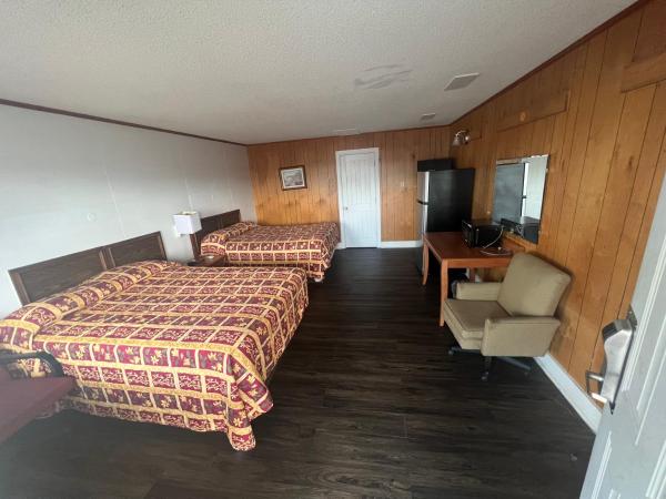 A la foto es mostra l'objecte Pinelodge Motel situat a la ciutat de Baxley.