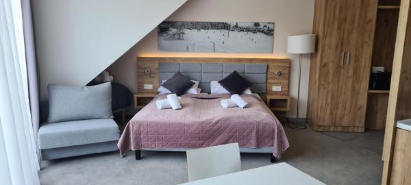Na zdjęciu widoczny jest obiekt Aparthotel Apartamenty Czarna Góra 403 położony w mieście Sienna.