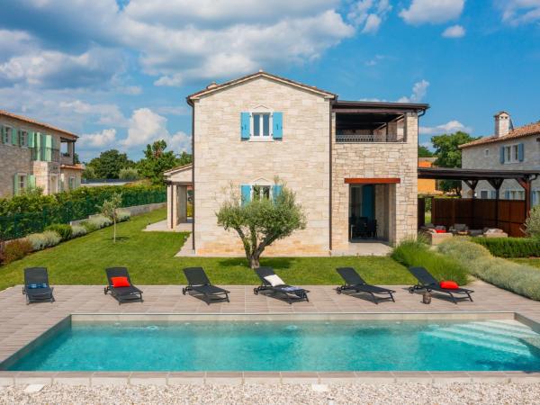 Na fotografii je vidět objekt Holiday Home Villa Grando II by Interhome nacházející se ve městě Mofardini.