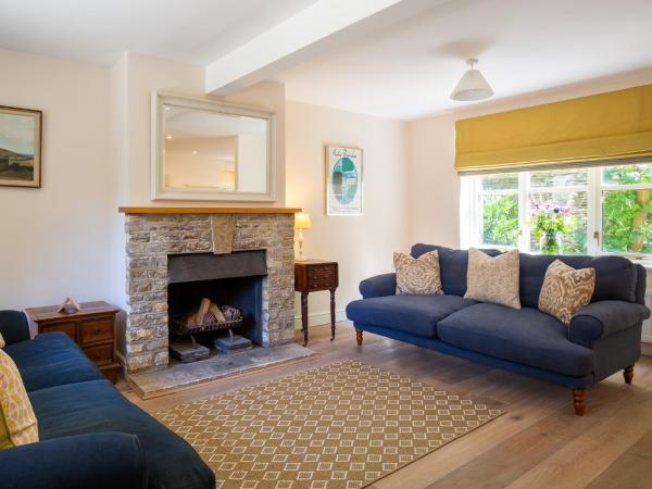 A la foto es mostra l'objecte Woodland Cottage situat a la ciutat de Temple Guiting.