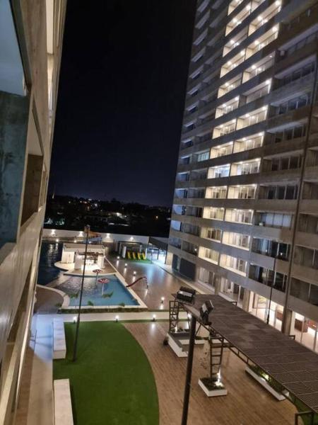 På bilden syns objektet Santa Cruz Hermoso Departamento Piscina Toboganes som ligger i staden Vila El Carmen.