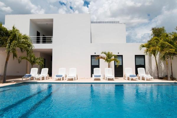 A la foto es mostra l'objecte Hotel & Suites Yuca Ville Siglo XXI situat a la ciutat de Xcumpich.