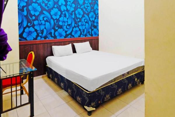 La photo montre l'objet Wisma Idola Palopo situé dans la ville de Bua.