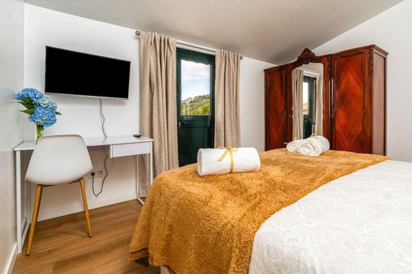 Nella foto è visibile l'oggetto Fénix House situato nella città di Arco da Calheta.