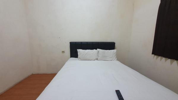 A la foto es mostra l'objecte RedDoorz Syariah At Demasto Homestay Jember situat a la ciutat de Jember.