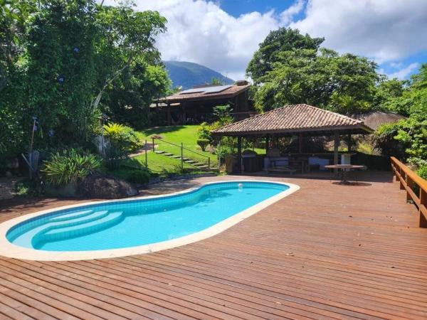 A la foto es mostra l'objecte Magnífica costeira em Ilhabela situat a la ciutat de Cambaquara.