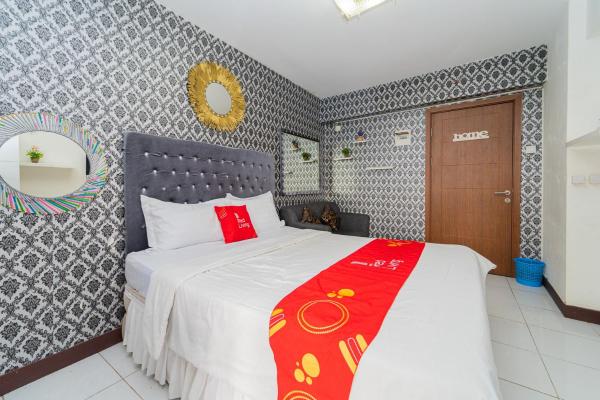 写真にはCinere市にあるRedLiving Apartemen Cinere Resort - Gold Roomが写っています。