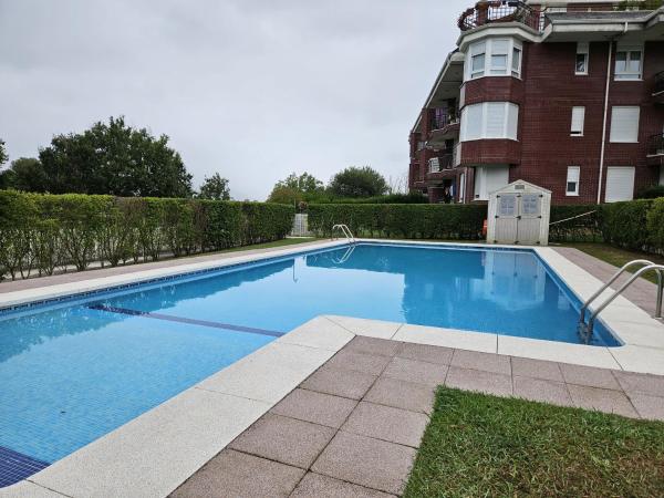 A la foto es mostra l'objecte C03A02 Apartamento con piscina y garaje situat a la ciutat de Treto.