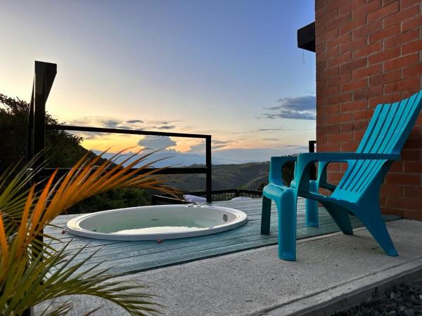 Kuvassa näkyy kohde Studio Suite Campestre con Jacuzzi, joka sijaitsee kaupungissa Buga.