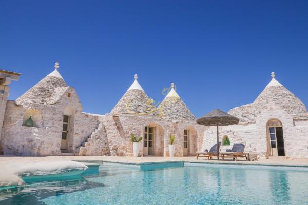 På billedet ses objektet Trulli & Dimore - I Trulli di Carole beliggende i byen Ostuni.