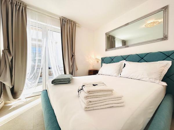På billedet ses objektet VILLA GIANNI dep - room VENEZIA - 4 stars beliggende i byen Lovran.