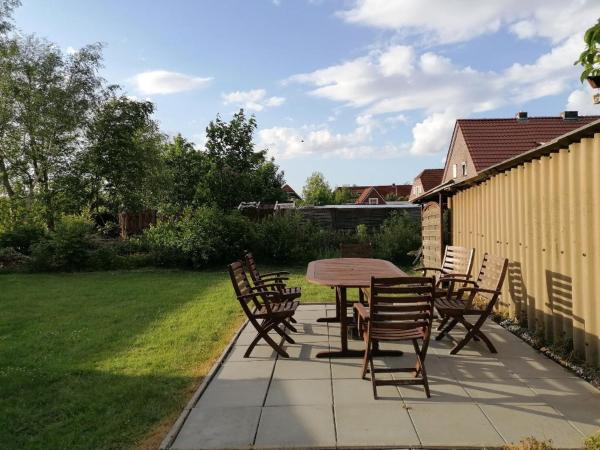 The photo shows the NEU! Ferienhaus NordseeGlück located in the city of Dornum.