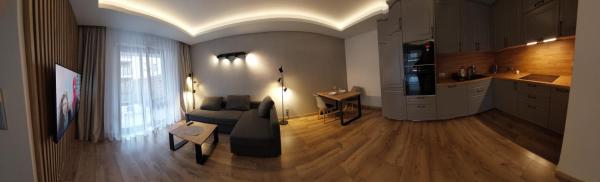 Na zdjęciu widoczny jest obiekt Apartament z tarasem położony w mieście Suchy Las.