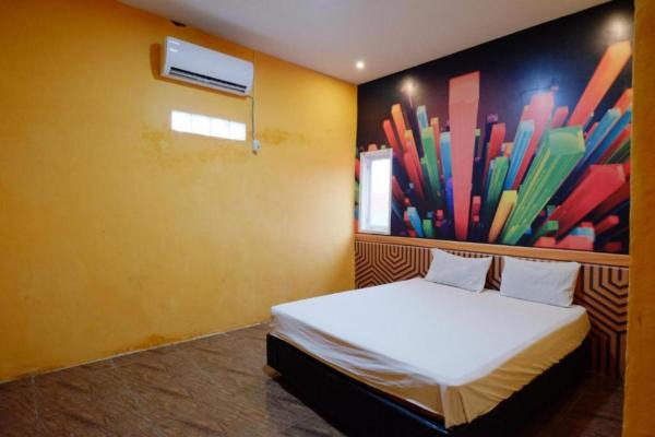 La photo montre l'objet Wisma Pelangi Palopo RedPartner situé dans la ville de Bua.