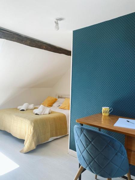 A la foto es mostra l'objecte Maison cosy avec 3 chambres et 3 salles de bains situat a la ciutat de Amiens.