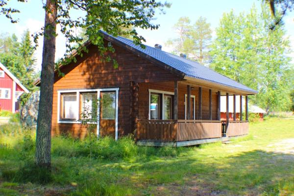 Na fotografii je vidět objekt Sandsjögården Holiday Resort nacházející se ve městě Stensele.