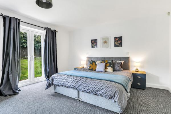 A la foto es mostra l'objecte Comfortable 3-Bed Dormer Bungalow Family & Business Friendly situat a la ciutat de Thringstone.