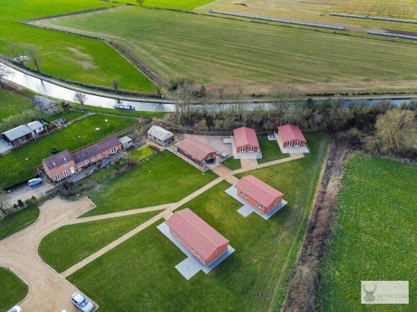 A la foto es mostra l'objecte Spacious 3 Bedroom Sandstone Lodge situat a la ciutat de Snarestone.