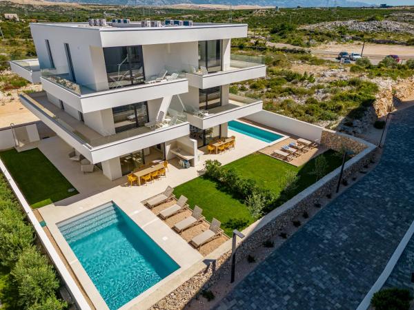A la foto es mostra l'objecte Villa Arenisca Novalja situat a la ciutat de Novalja.