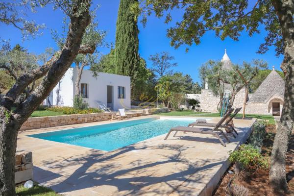 Op de foto is het object TD Trulli Tortorella with Nature Pool & Sauna te zien, gelegen in de stad Santa Lucia.