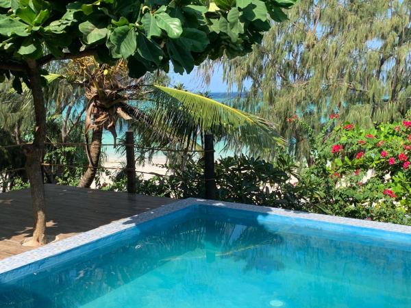 Na foto é possível ver o objeto Zi Villa Dhow Beach Cottage localizado na cidade de Matemwe.