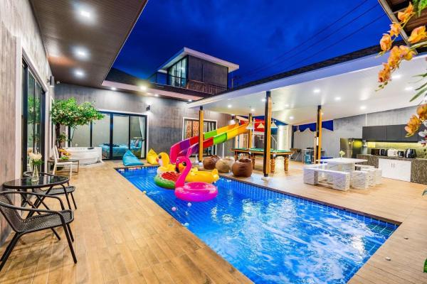 A la foto es mostra l'objecte White Cloud & Brown Sand Luxury Pool Villa Cha-Am situat a la ciutat de Cha-am.