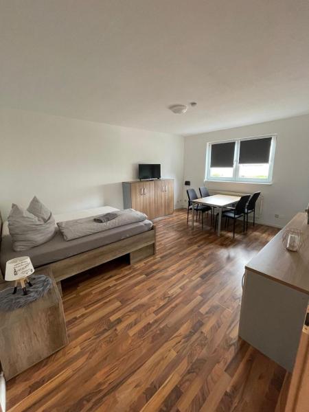 På billedet ses objektet Wohnung in Möser mit Grillmöglichkeit beliggende i byen Möser.