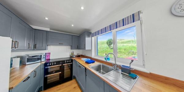 A la foto es mostra l'objecte Pet Friendly 1Br Modernised Cottage with Fibre WiFi situat a la ciutat de Strathy.