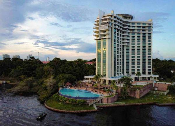 A la foto es mostra l'objecte Flat em Tropical Executive Hotel situat a la ciutat de Manaus.
