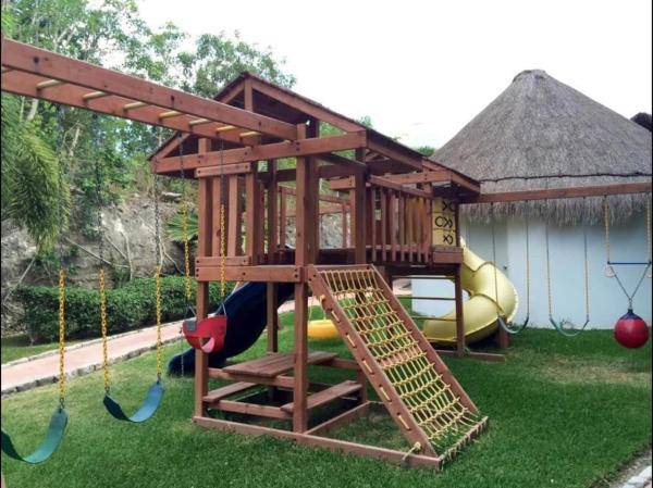 Na fotografii je vidět objekt Cozy Apartments in Puerto Morelos nacházející se ve městě Puerto Morelos.