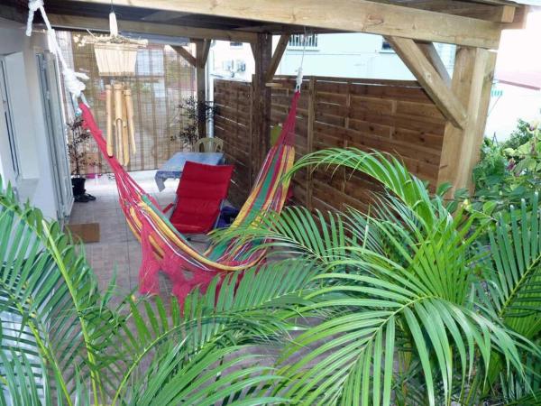 En la foto se muestra el objeto Logement dans un lieu calme et verdoyant à proximité de tout avec Jacuzzi!!! ubicado en la ciudad de Basse-Terre.