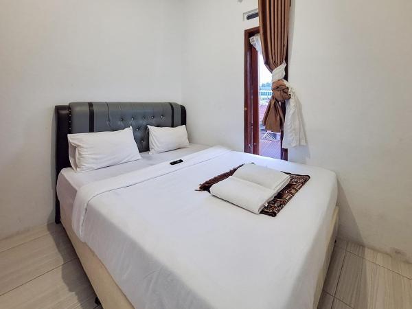A la foto es mostra l'objecte RedDoorz Syariah at Galliano Homestay Bukittinggi situat a la ciutat de Bukittinggi.