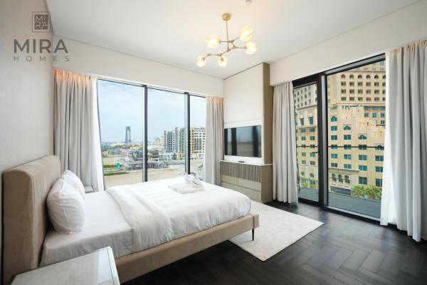 A la foto es mostra l'objecte Mira Holiday Homes - Newly 1 bedroom with pool access situat a la ciutat de Dubai.