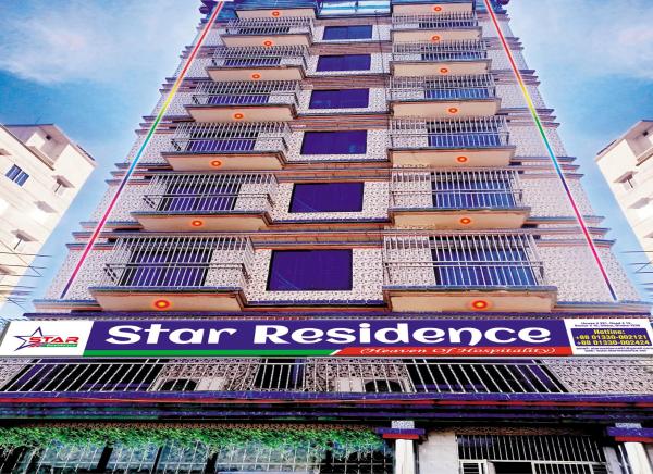 The photo shows the Star Residence located in the city of Rājābāri.