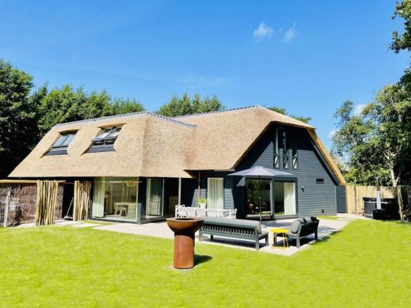 A la foto es mostra l'objecte Luxe vakantievilla 'Sieta' op Ameland met wellness situat a la ciutat de Ballum.