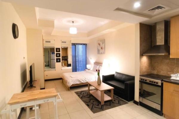 StoneTree - Lovely Studio in Goldcrest View 1, Dubái
