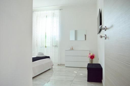 A la foto es mostra l'objecte La Casa di Margi situat a la ciutat de Nàpols.