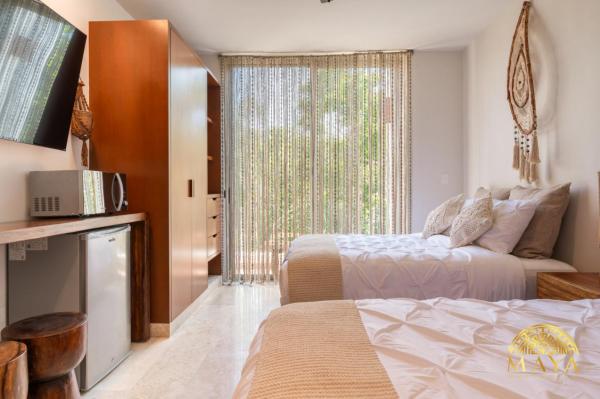 Na zdjęciu widoczny jest obiekt NHOA 302C Lux 1BR Condo Top Jungle View Aldea Zama położony w mieście Tulum.