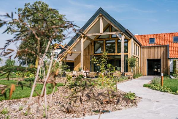 Na zdjęciu widoczny jest obiekt Op Oost Boutique hotel & Restaurant het Kook Atelier położony w mieście Oost.